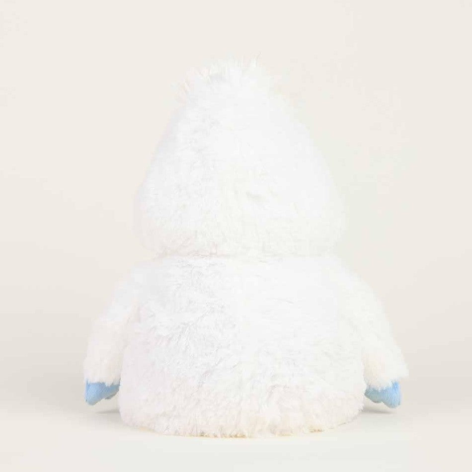 Fluffy white stuffed toy with blue hands, back view.