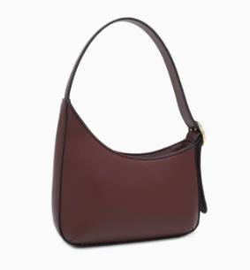 Brown leather handbag with a curved design and a single strap.