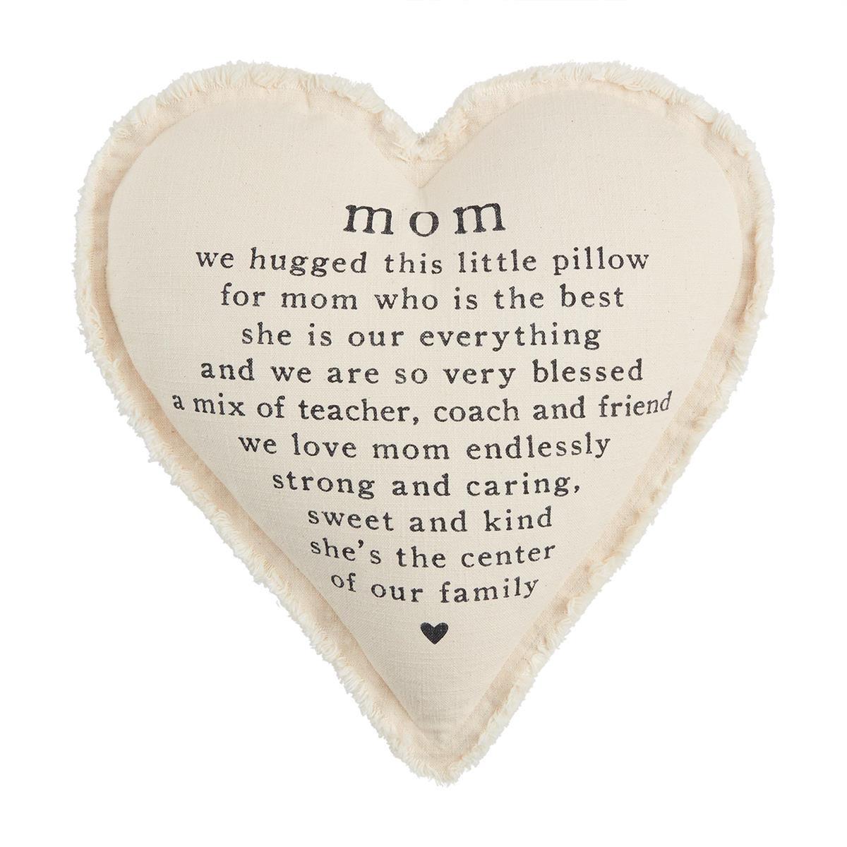 Heart-shaped pillow with a loving message for mom.