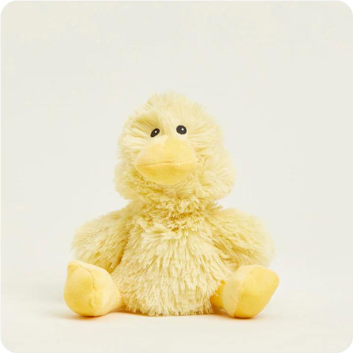 Fluffy yellow duck plush toy with a soft, textured appearance.