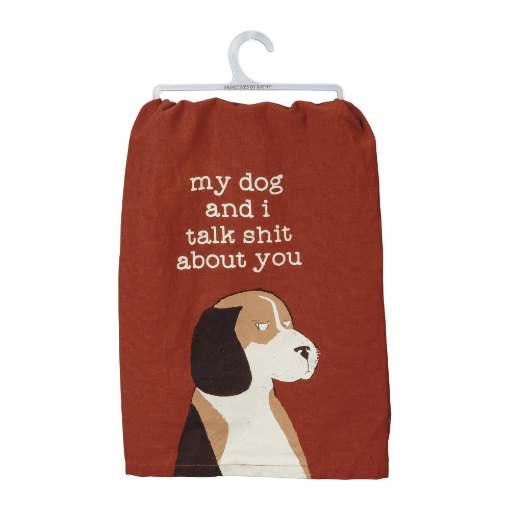 Brown towel with a dog and humorous text.
