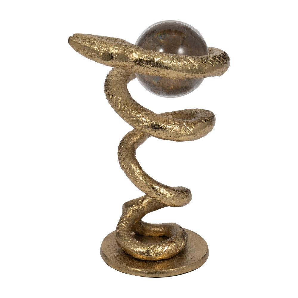 Golden snake sculpture entwined around a glass orb.
