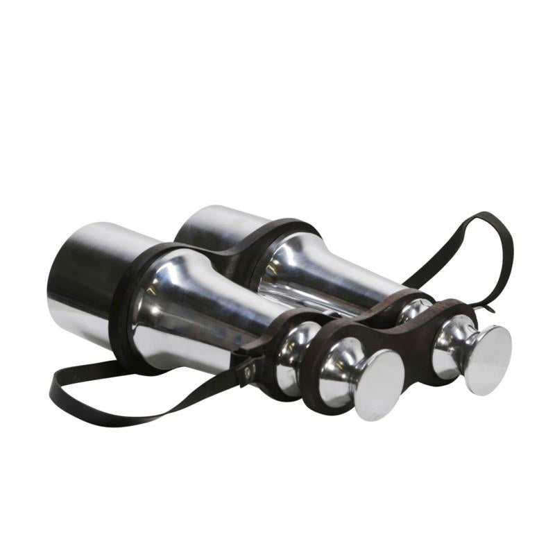 Two metallic rocket boosters with straps attached.