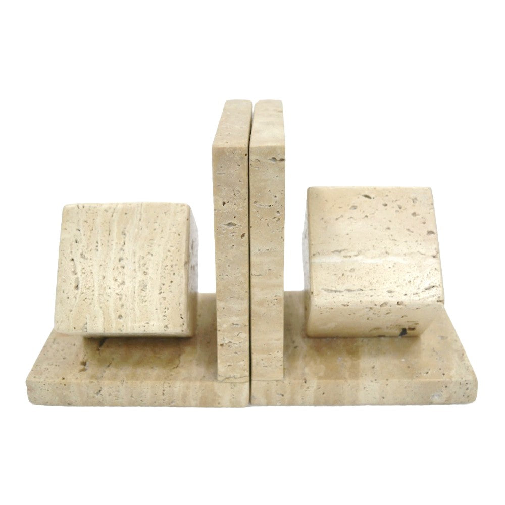 Beige travertine marble bookends with geometric shapes.