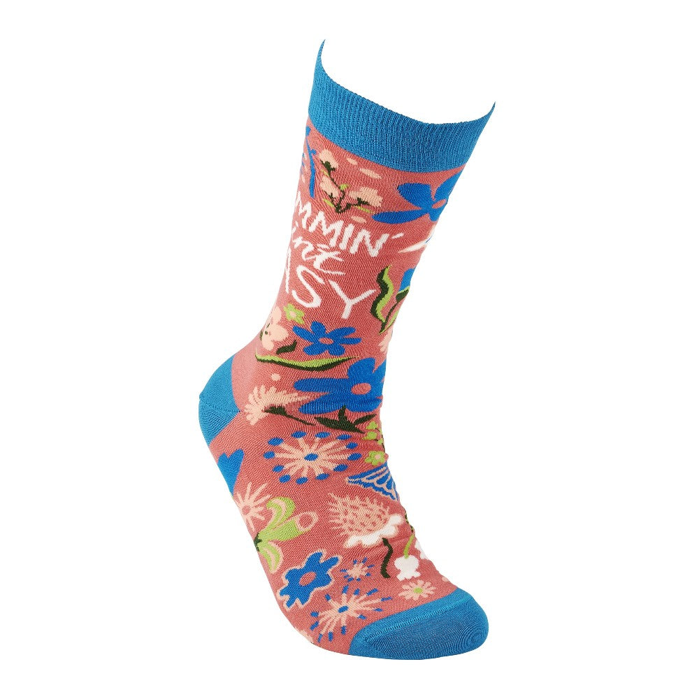 Floral sock with blue toe and cuff, featuring playful text design.