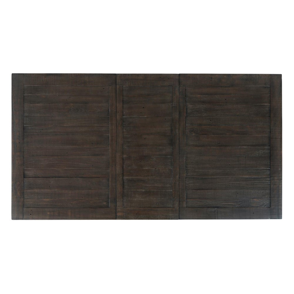 Dark wooden table top with a paneled design.