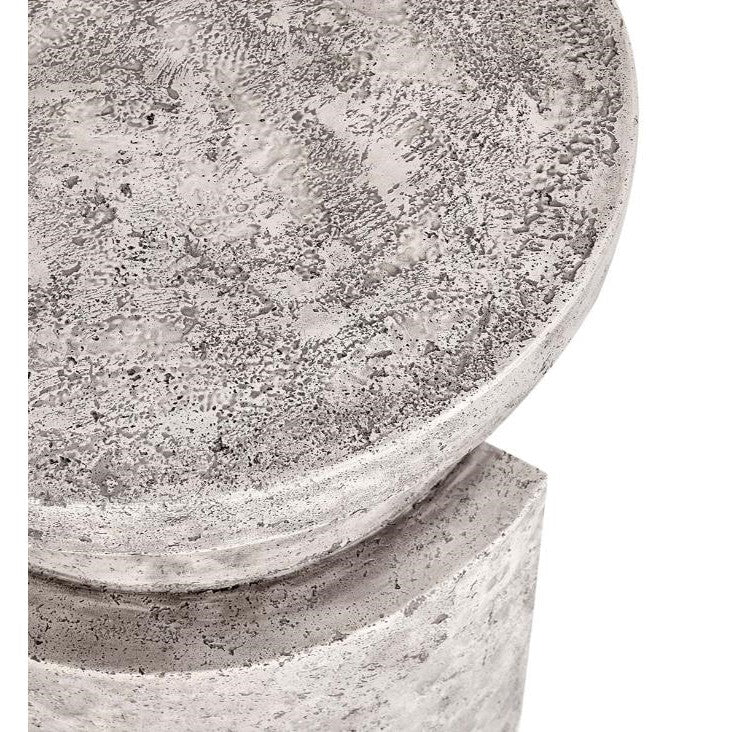 Textured concrete surface with round shape detail.