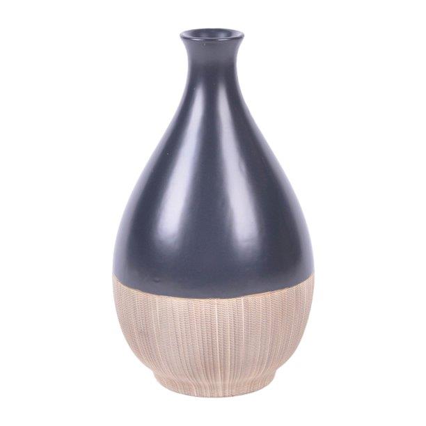 Elegant vase, dark top with woven base, minimalist design.