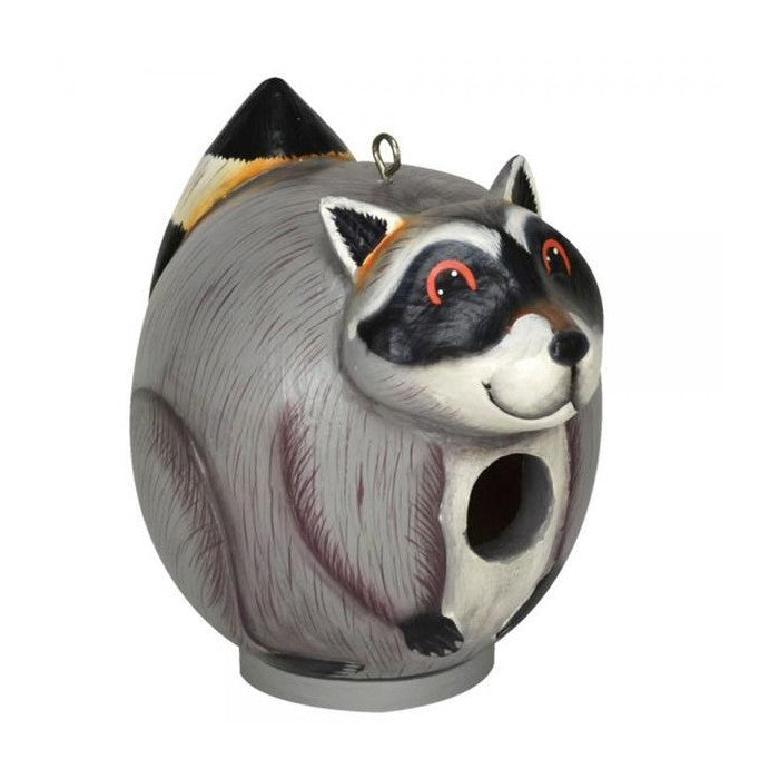 Raccoon-shaped birdhouse with a whimsical design.