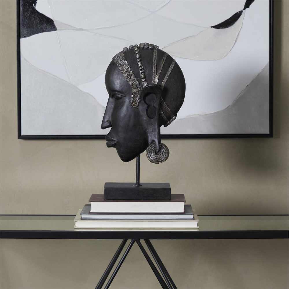 Sculpture head on books with abstract art background.