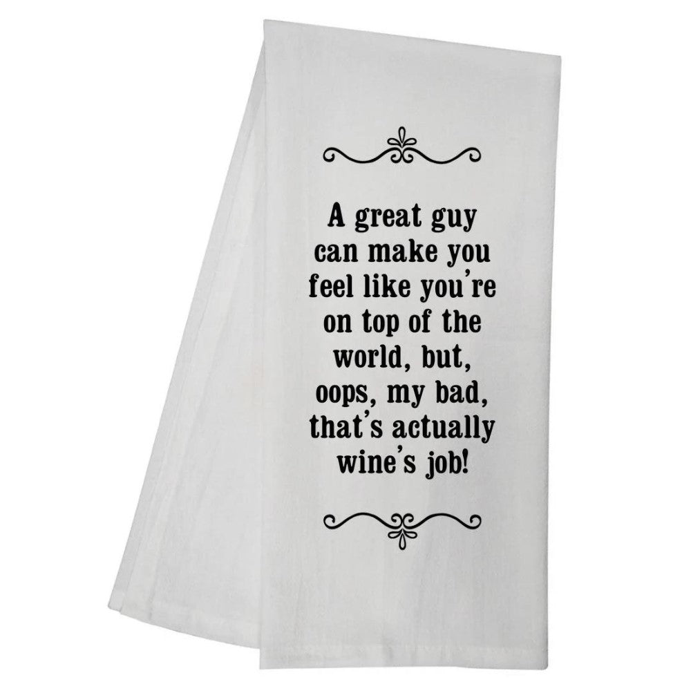 White towel with humorous quote about wine's job.