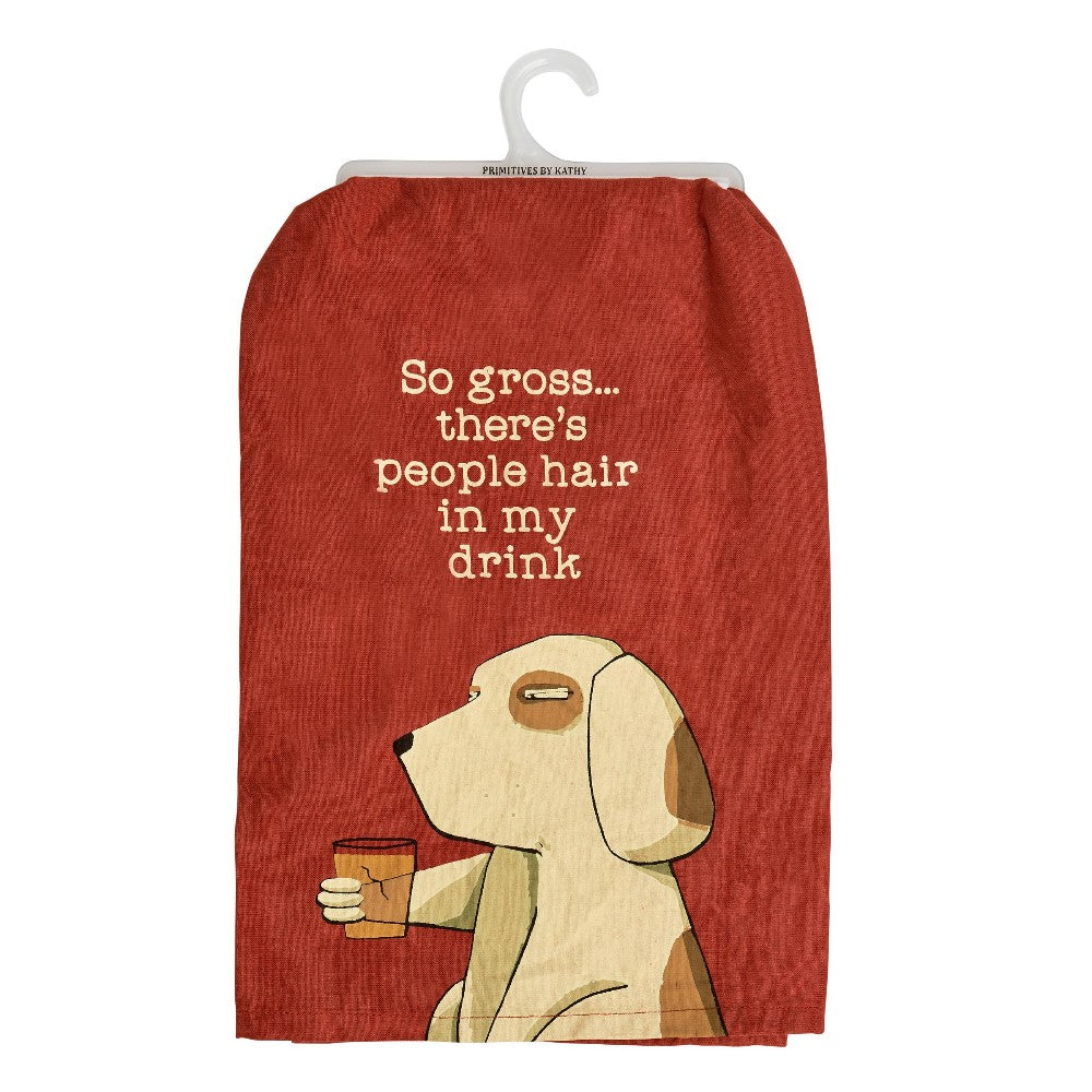 Red towel with a dog holding a drink, captioned humorous complaint about hair.