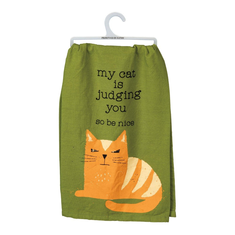Green towel with text and an illustration of an orange cat.