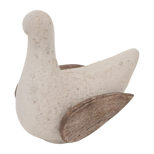 Beige bird sculpture with textured wings.