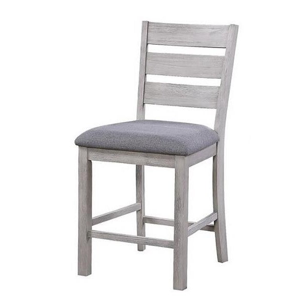 Gray wooden chair with cushioned seat and slatted back.