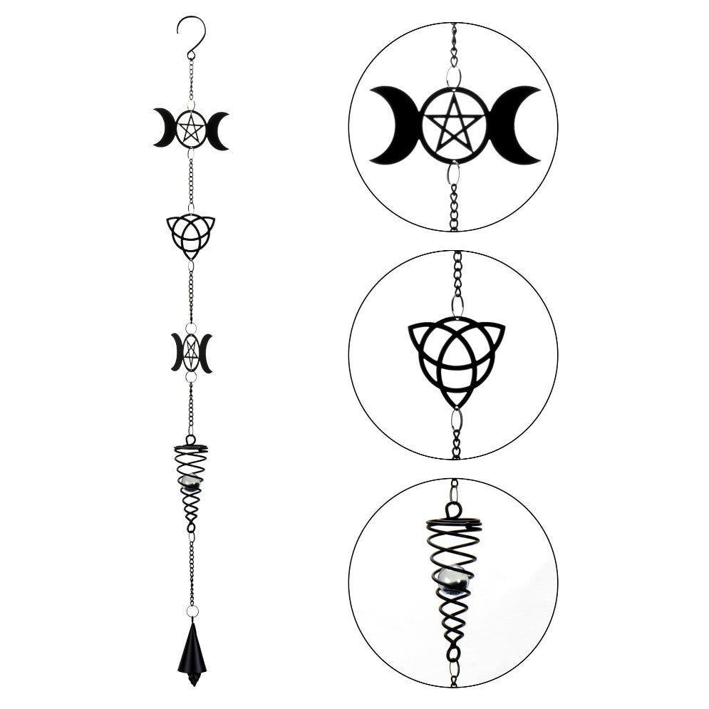 Black hanging wind chime with celestial and spiral designs.