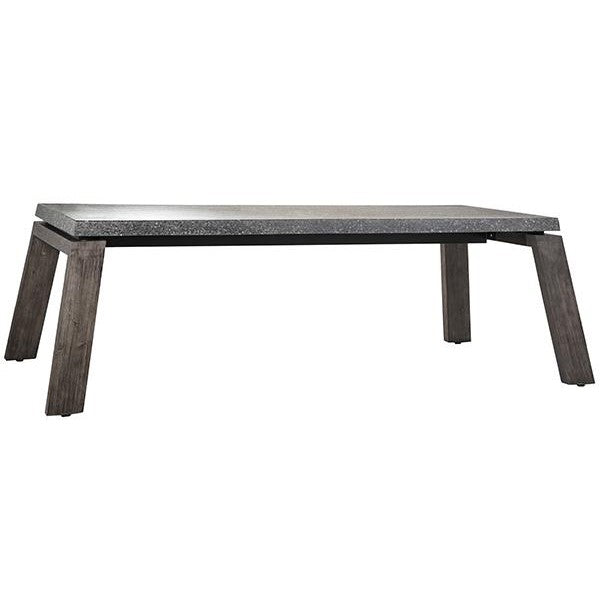 Modern table with angled wooden legs and a sleek rectangular top.