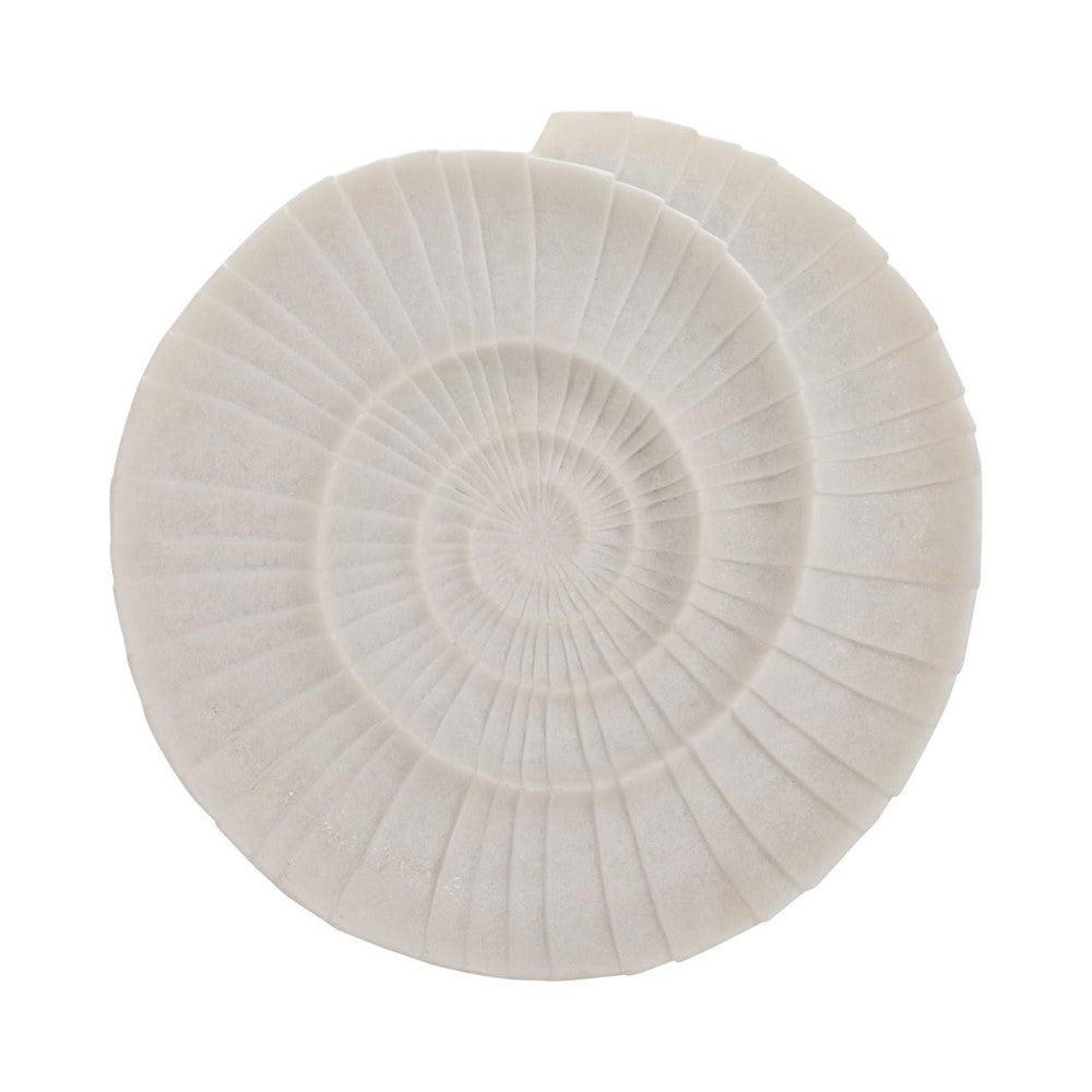 White spiral shell-like design on a flat surface.