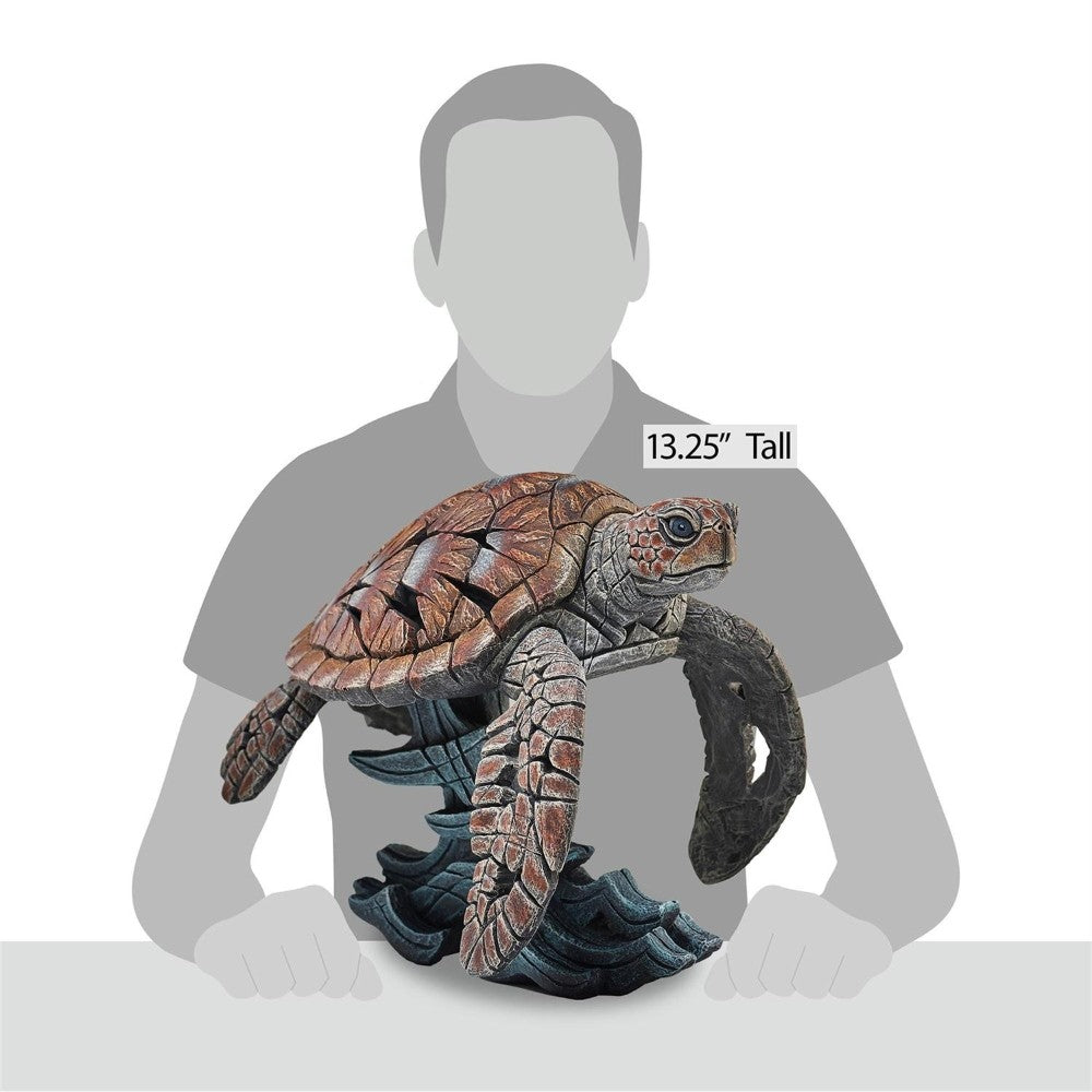 Turtle sculpture in front of a silhouette, labeled as 13.25" tall.