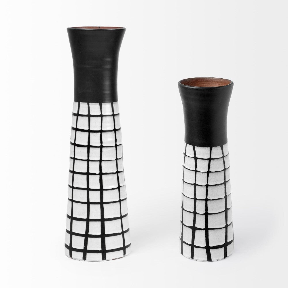 Two black and white grid-patterned vases on a white background.