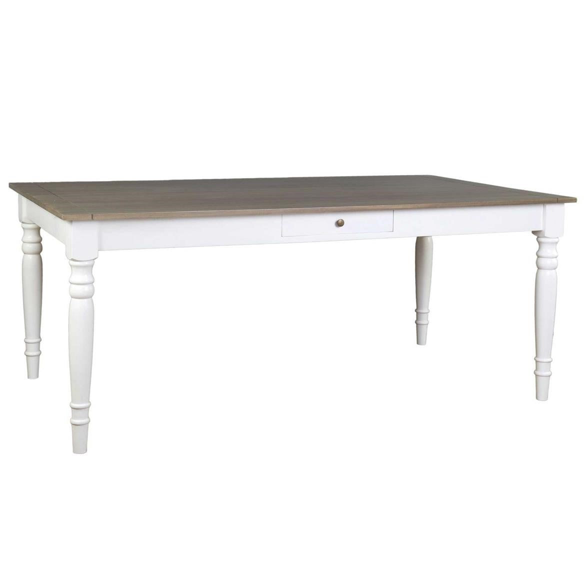 White wooden table with a dark top and turned legs.