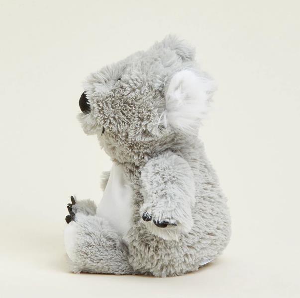 Fluffy gray koala plush toy sitting sideways.