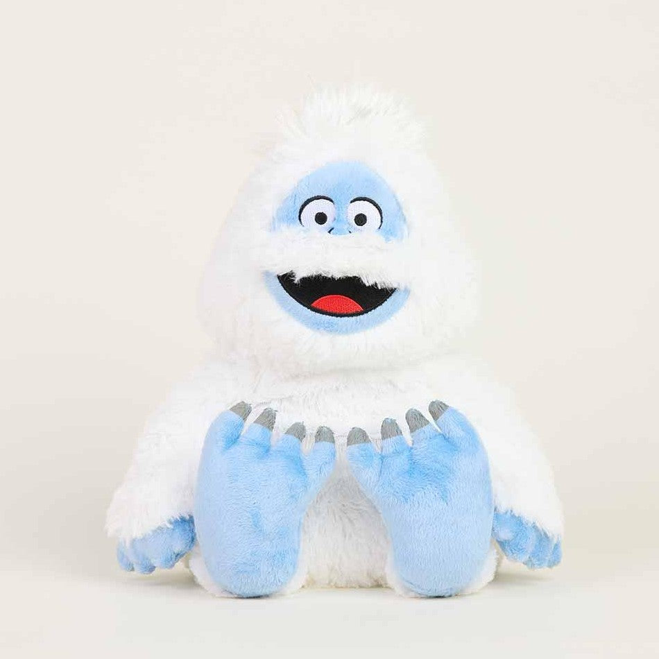 Fluffy white and blue yeti plush toy with a big smile.