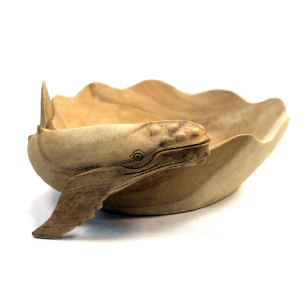 Wooden whale-shaped bowl with detailed carving.