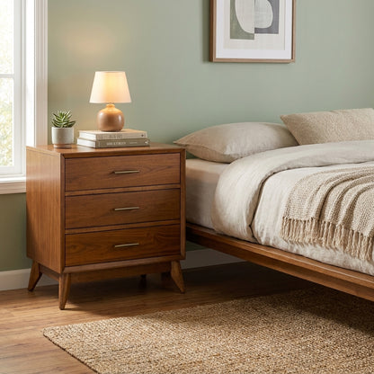 Mid-century modern wooden dresser with three drawers.
