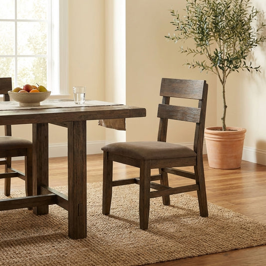 Wooden chair with cushioned seat and slatted backrest.