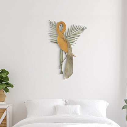Wall art of a bird with leaves above a bed in a minimalistic room.