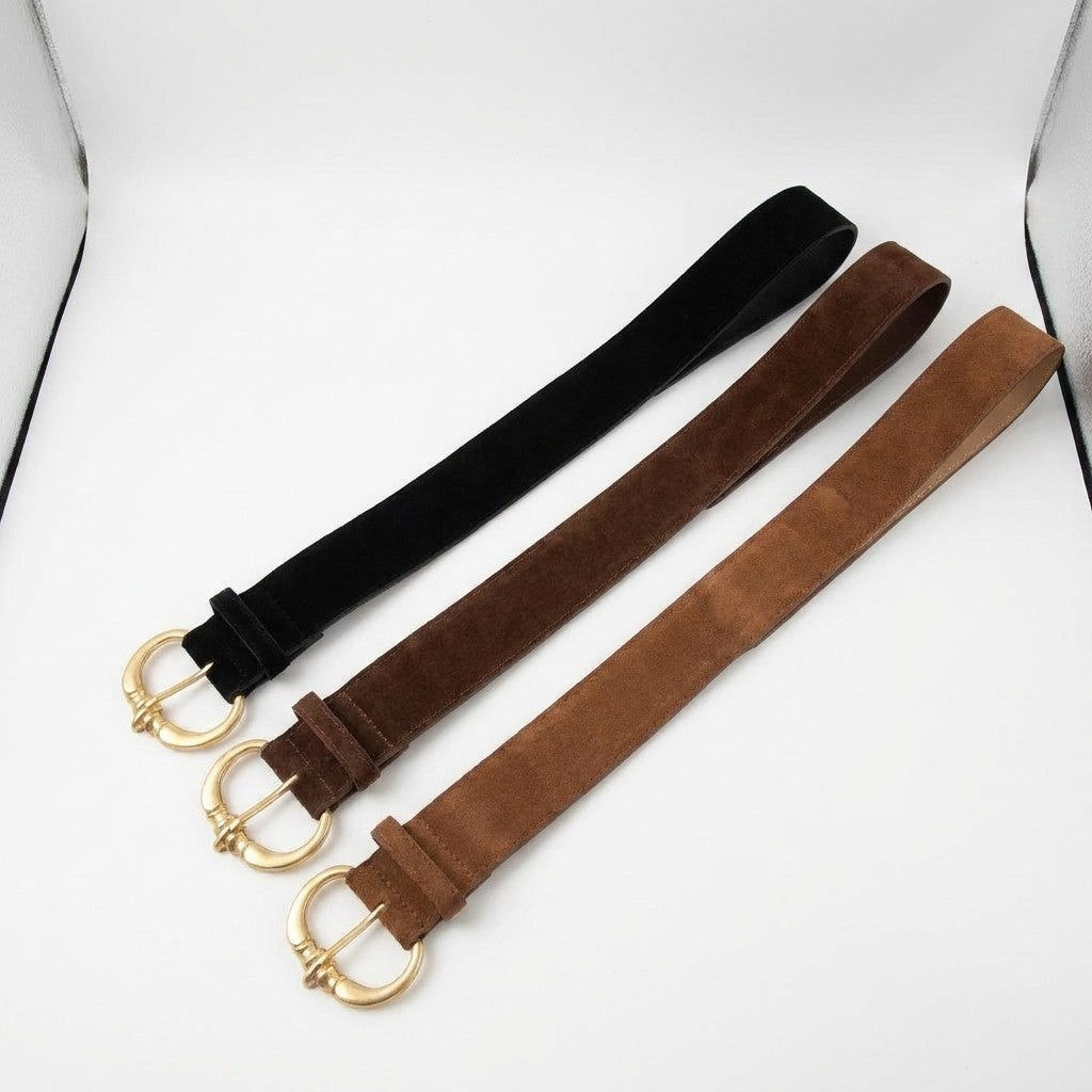 Three suede belts: black, dark brown, tan with gold buckles.