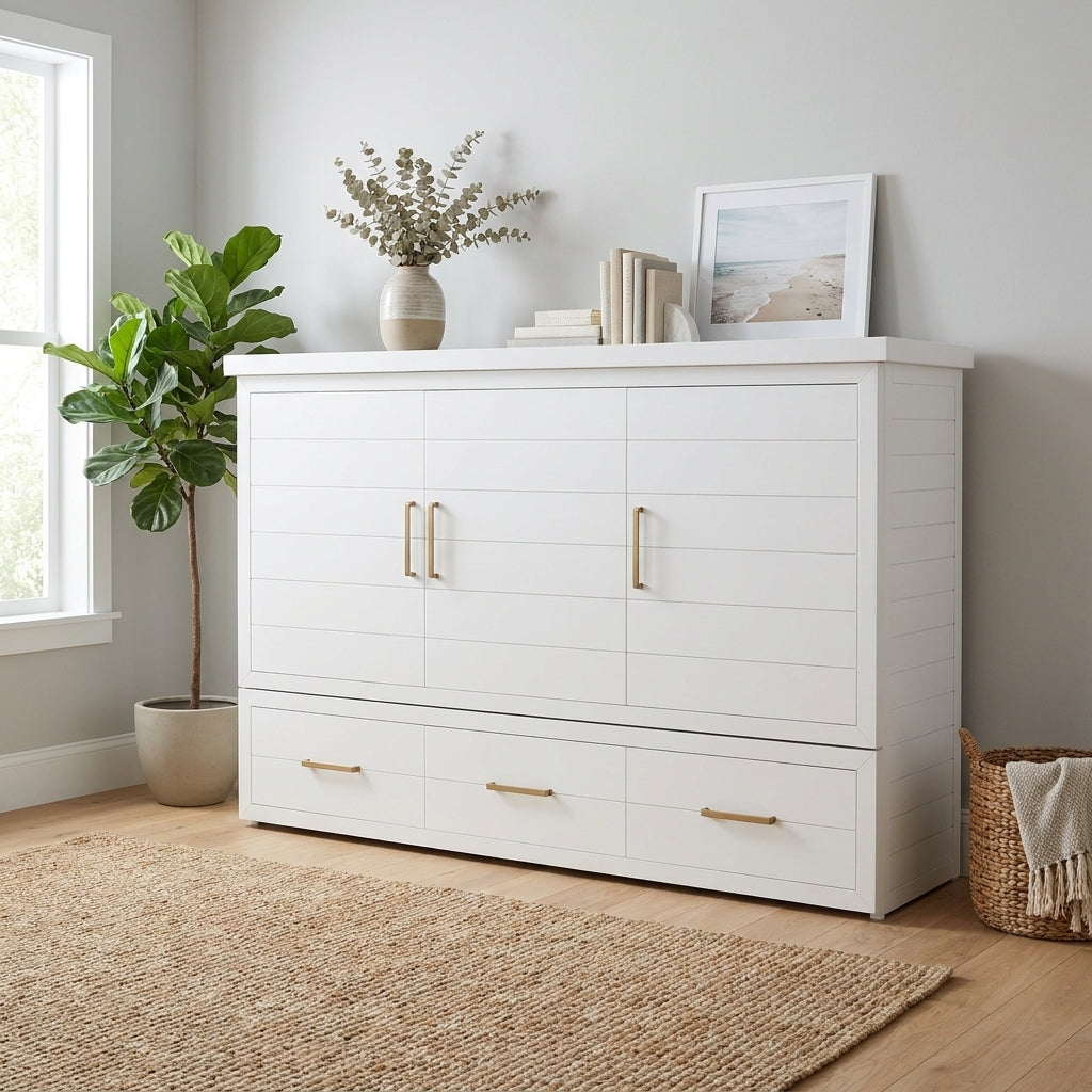 White cabinet with decor, plant, and rug in a bright room.