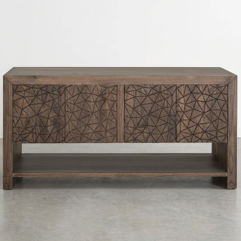 A wooden sideboard with geometric carved doors and an open lower shelf.