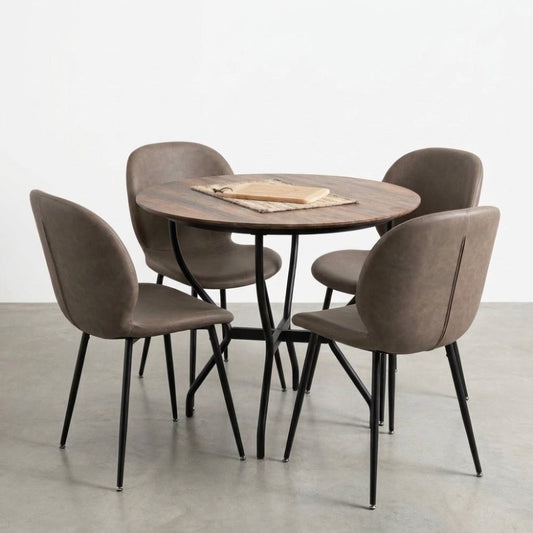 Round wooden table with four brown chairs on a gray floor.