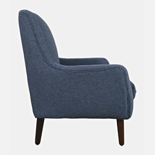 Blue upholstered armchair with dark wooden legs, shown from the side.