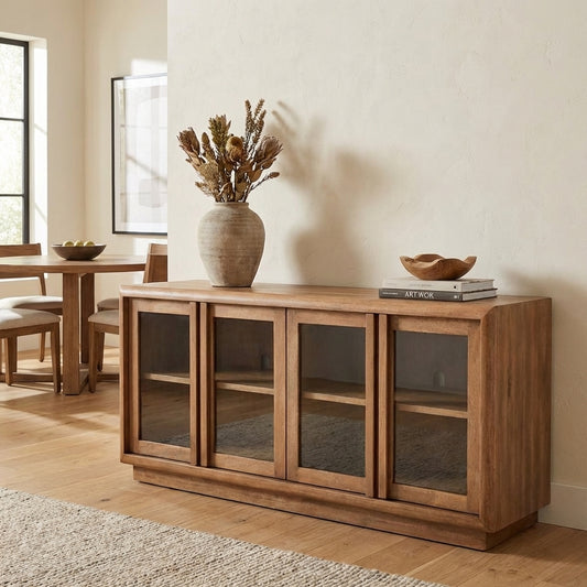 Wooden sideboard with four glass-paneled doors and shelves.