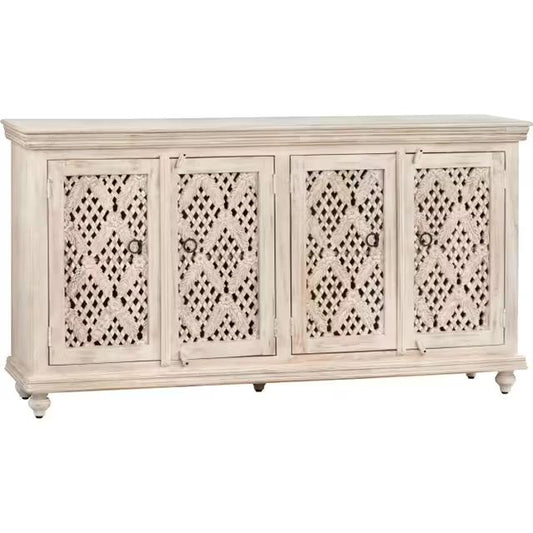 Ornate whitewashed sideboard with lattice doors and vintage knobs.