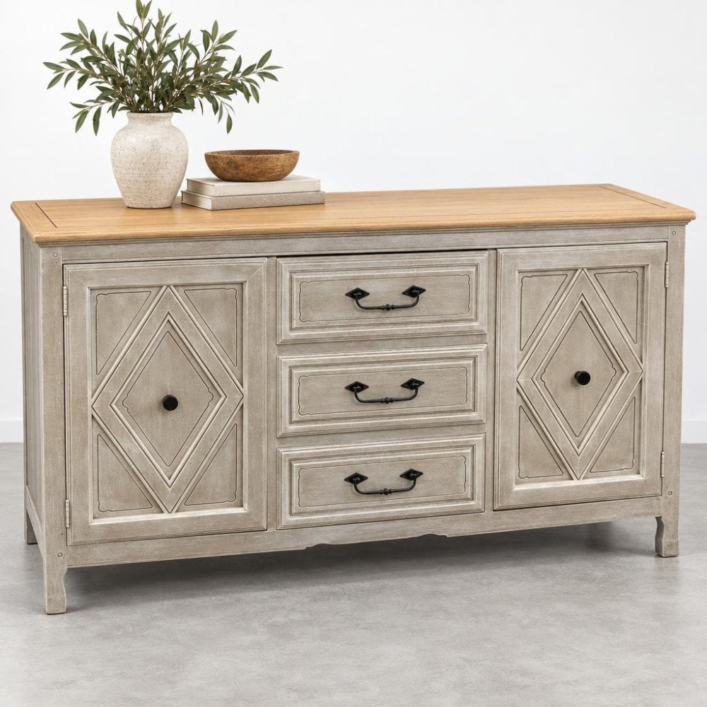 Gray sideboard with wood top, two cabinets, and three drawers; decor includes a vase and bowl.