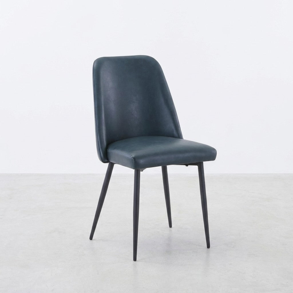 Modern chair with curved backrest and slim, black metal legs.