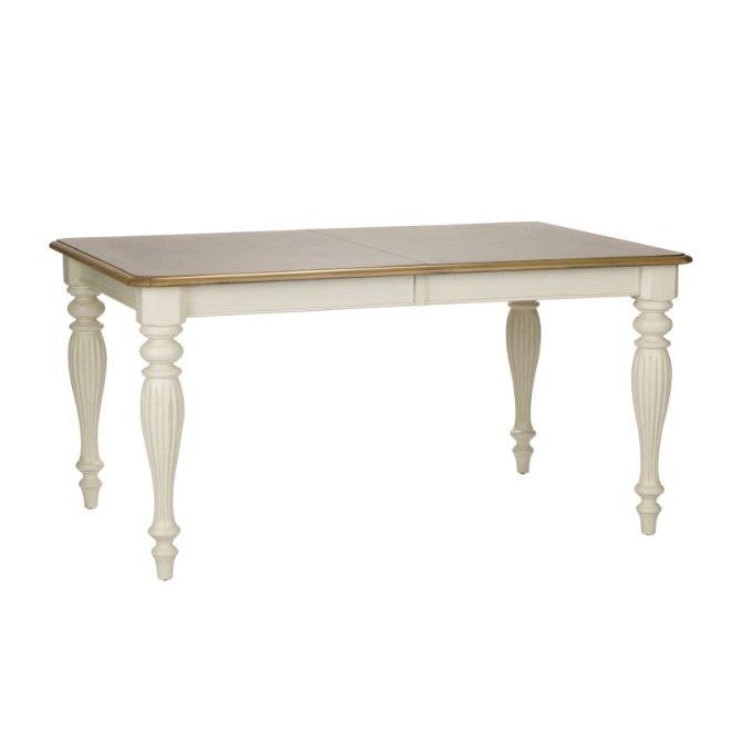 Elegant dining table with carved legs and wooden top.