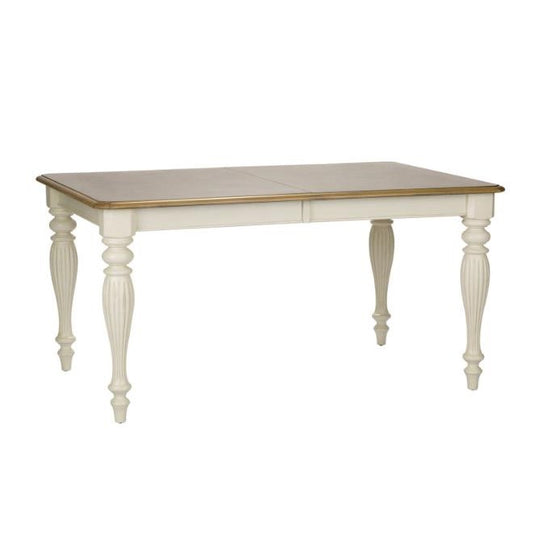 Elegant dining table with carved legs and wooden top.