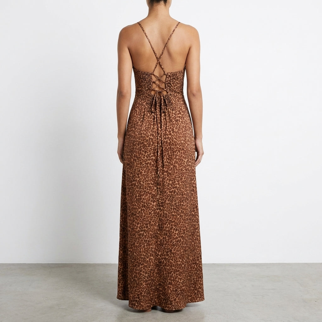 Woman in a leopard-print dress with criss-cross back.