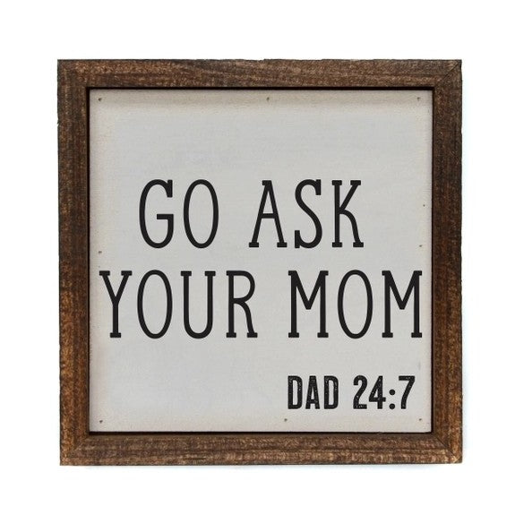Wooden sign: "GO ASK YOUR MOM - DAD 24:7".