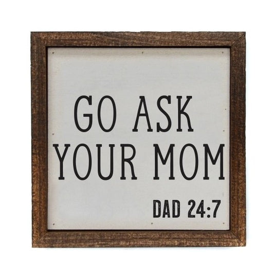 Wooden sign: "GO ASK YOUR MOM - DAD 24:7".