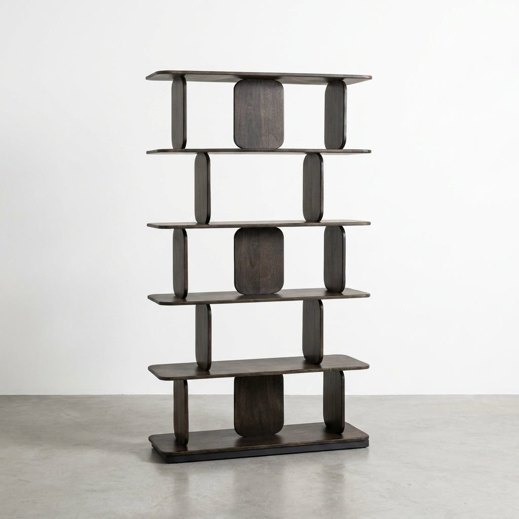 Modern dark wood bookshelf on a minimalist concrete floor.