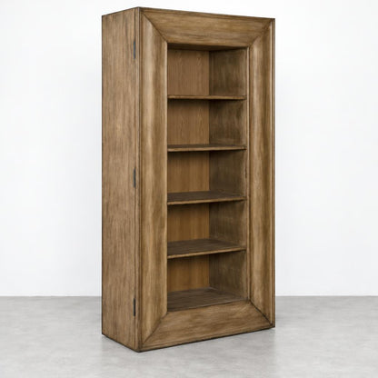 A tall wooden cabinet with open shelves and a narrow side door stands against a plain wall.