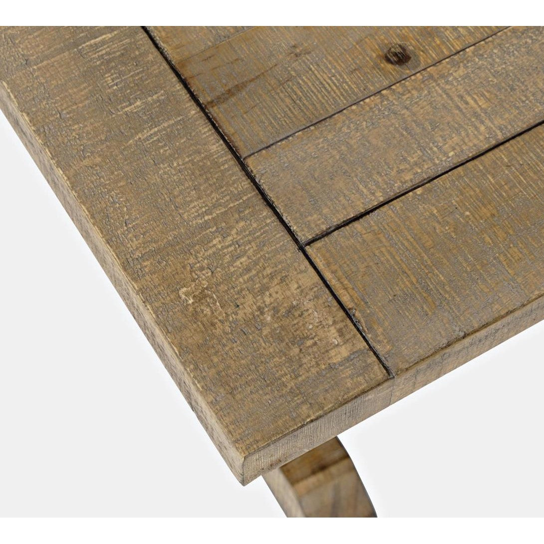 Close-up of a rustic wooden table corner.