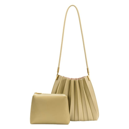 Beige pleated handbag with matching cosmetic pouch.