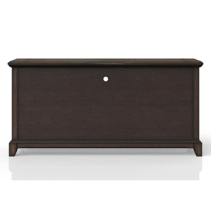 Dark wooden chest with a small circular hole in the center.